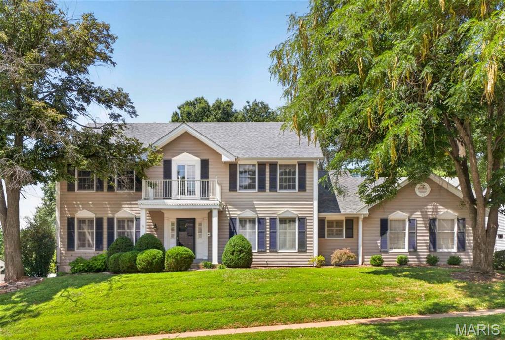 Welcome to Chesterfield Trails! This beautifully maintained 2-story home offers over 3,000 square feet of living space with 4 bedrooms, 2 full and 1 half baths, a rear-entry garage, and a private in-ground pool. Step inside to find hardwood flooring throughout the foyer, formal living and dining rooms, and a spacious family room featuring custom built-in bookcases and a cozy fireplace. The open floor plan flows into the breakfast room and well-appointed kitchen with stainless steel appliances, abundant cabinetry, and convenient main-floor laundry. Upstairs, the spacious primary suite features a walk-in closet and an updated bath with a glass-enclosed shower, soaking tub, and double vanity. Three additional bedrooms and a full bath complete the upper level. The partially finished lower level provides flexible living space, generous storage, and endless possibilities for a home office, gym, or recreation area. Outside, enjoy your own backyard retreat with a fenced, private in-ground pool surrounded by mature trees and professional landscaping. Conveniently located near Highway 40/64, shopping, restaurants, parks, and award-winning Parkway schools, this home offers the perfect blend of comfort, style, and location.