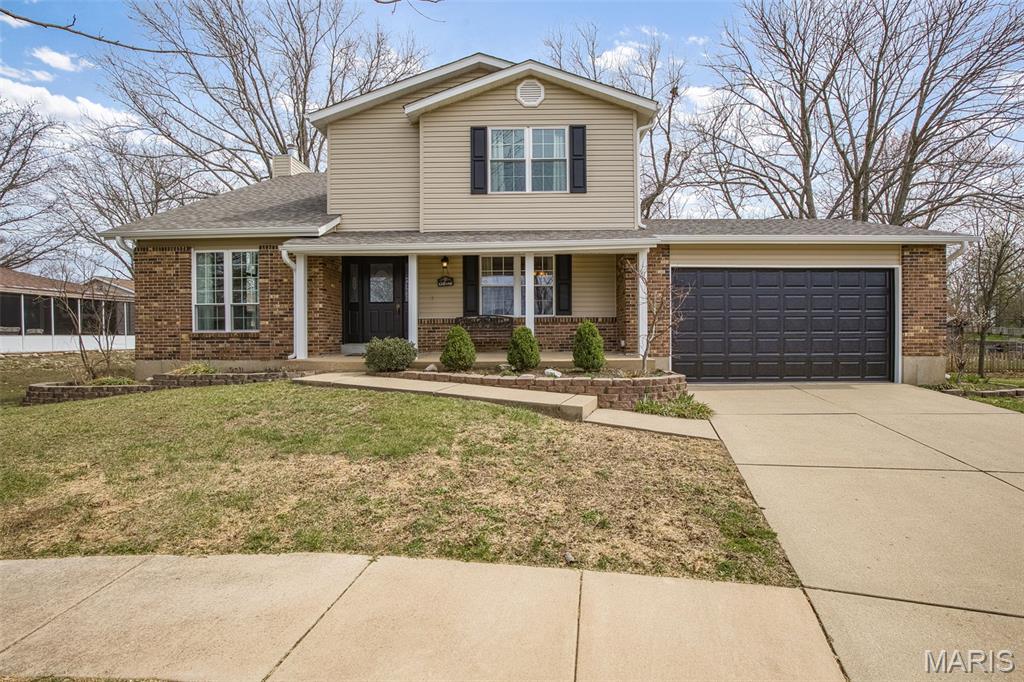 Wow! Beautifully updated 2-story tucked on a quiet cul-de-sac in the sought-after Oakville Schools attendance area! This 4 bed, 2.5 bath home shines with gorgeous wood floors, an updated kitchen with granite counters, and convenient main floor laundry. The newly refreshed primary bath adds a stylish, modern touch. Love outdoor living? You’ll enjoy the fantastic screened-in porch, wraparound deck, and patio—perfect for relaxing or entertaining! The walkout lower level is ready for your finishing ideas and offers amazing potential for added living space. Major exterior updates include new siding, garage door, and roof for fantastic curb appeal and peace of mind. 2-car garage and a great cul-de-sac location make this one a must-see!