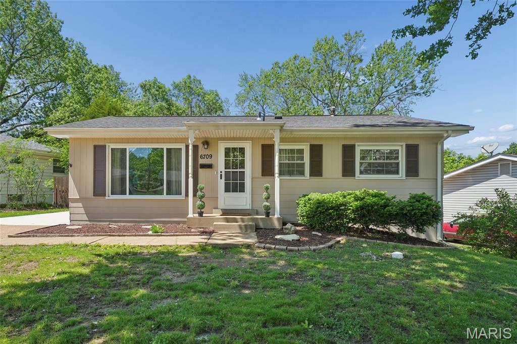 Welcome home to a beautifully updated, truly move-in-ready gem. Every inch of this 3-bed, 2-bath home has been thoughtfully refreshed, from the cosmetic finishes you’ll love to the major systems that give you peace of mind. With a brand-new roof, new HVAC systems, new water heater, and even a new parking pad, the big-ticket items are already taken care of so you can settle in and start enjoying your new space right away. Inside, refinished hardwood floors create a warm, welcoming main level. The kitchen blends style and function with modern finishes and a movable island that stays with the home. The finished lower level expands your living space even more, offering a rec area and bonus room ideal for an additional sleeping space, home office, playroom, or creative studio, whichever fits your lifestyle. Step outside to a level, fenced backyard designed for easy living. Enjoy morning coffee or evening downtime on the covered deck and take advantage of the included shed for extra storage. This home offers the rare combination of modern comfort, major system upgrades, and true move-in readiness.  Schedule your visit and experience the value for yourself. Cozy, cared for, and completely ready for you!