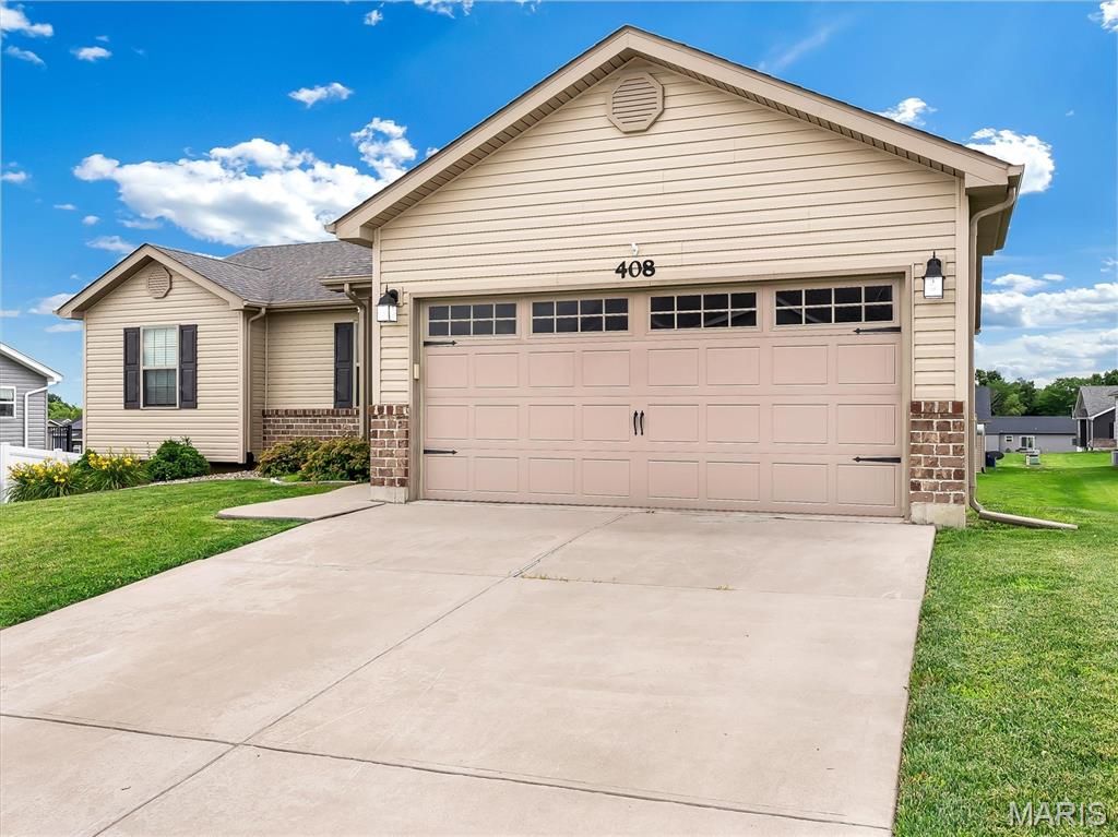 Discover the ease of a single-story beautifully maintained ranch. The heart of this home is its thoughtfully designed kitchen, featuring a G-shaped layout with a convenient peninsula, perfect for casual dining or entertaining. Stainless steel appliances complete this functional and inviting space. Large primary suite has vaulted ceilings, ensuite bath with a double vanity, walk-in shower for a spa-like experience and a walk in closet. Two additional spacious bedrooms.  Lower level is ready to be customized to your needs and features a walk out, egress window and a rough in for a future bath.  This home extends its living space outdoors with a private yard, offering a tranquil retreat. Enjoy leisurely mornings on the porch or host gatherings on the patio.  Embrace the opportunity to make this exceptional property your new home.