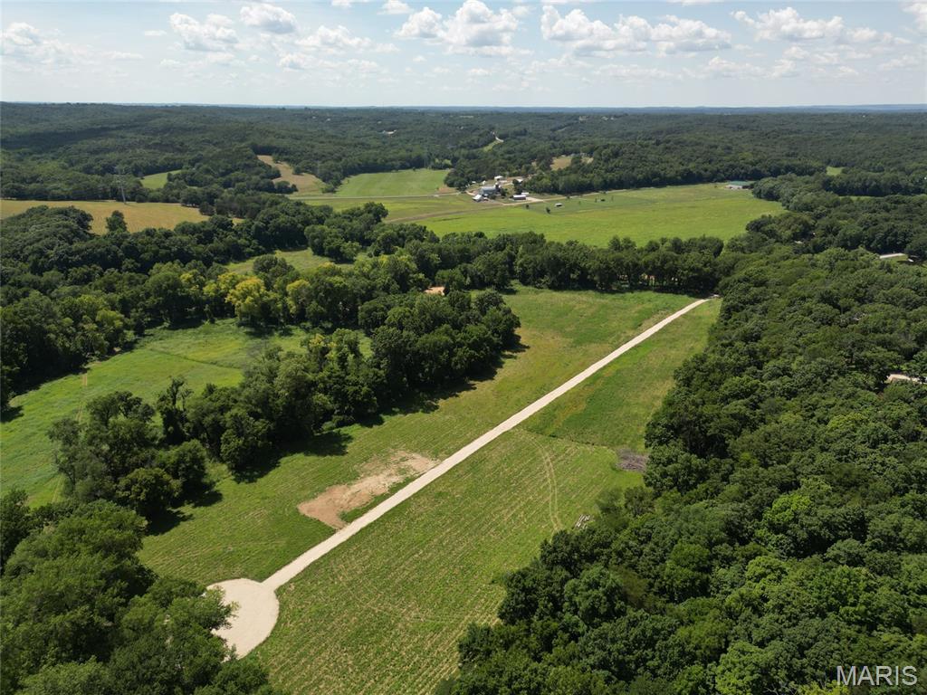 A standout feature of this property is its direct access to Plattin Creek, creating endless opportunities for outdoor enjoyment. Spend your days fishing for bass and panfish, wading the creek on warm summer afternoons, or simply relaxing by the water listening to the peaceful flow. The creek frontage adds both natural beauty and functional recreation, making this tract truly special.

Discover the perfect blend of convenience and outdoor adventure with this 12± acre recreational retreat just 5 minutes from Festus and only 40 minutes from St. Louis. Tucked away in a peaceful setting yet easily accessible, this Grade A recreational property offers the ideal escape without sacrificing proximity to town.

This lot is recreational only, not a build site. Lot is in flood plain.