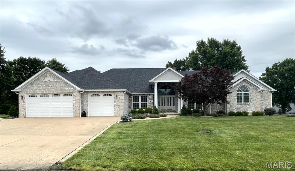 Welcome to 5 Woods Fort Ct, Troy, MO. The custom, one owner home offers elegance & comfort. Offering over 5,000 sq.ft. of living space. Features include: large foyer, formal dining, sitting area, office, laundry, breakfast room, large kitchen with sitting area, living room, 2 fireplaces, 2 guest bedrooms, master suite with his & her closets and master bath suite. The lower level is set up for entertaining with bar, bath and storage area. Additional features include a walk in safe, screened in deck w/elevator, large patio, covered patio off living room, 5 car plus garage. Home sits on 2 lots adding up to just under one acre. Located in private Woods Fort development overlooking Woods Fort Country Club. Opportunity to purchase this type of home in this location does not happen often.