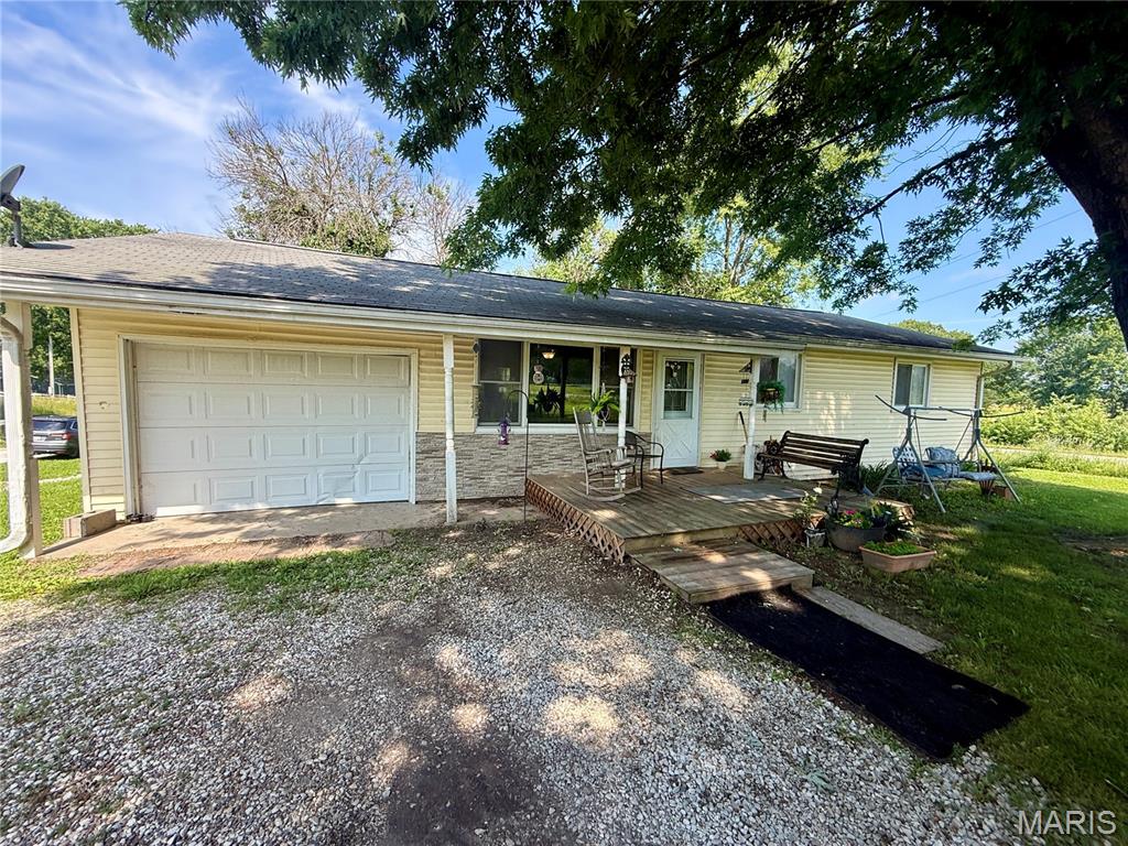 Nestled on the edge of town, this charming home offers the perfect blend of peaceful country living with the convenience of nearby town amenities. Featuring 4 bedrooms and 1 bathroom, all on the main level, this home provides comfortable, easy living. Step outside onto the back deck and enjoy watching deer, squirrels, and other wildlife in your own backyard. Gather around the outdoor fire pit for relaxing evenings or entertaining family and friends. Situated on a ¼-acre lot, the property also includes a one-car attached garage. If you're looking for a quiet setting without sacrificing convenience, this home is a must-see!