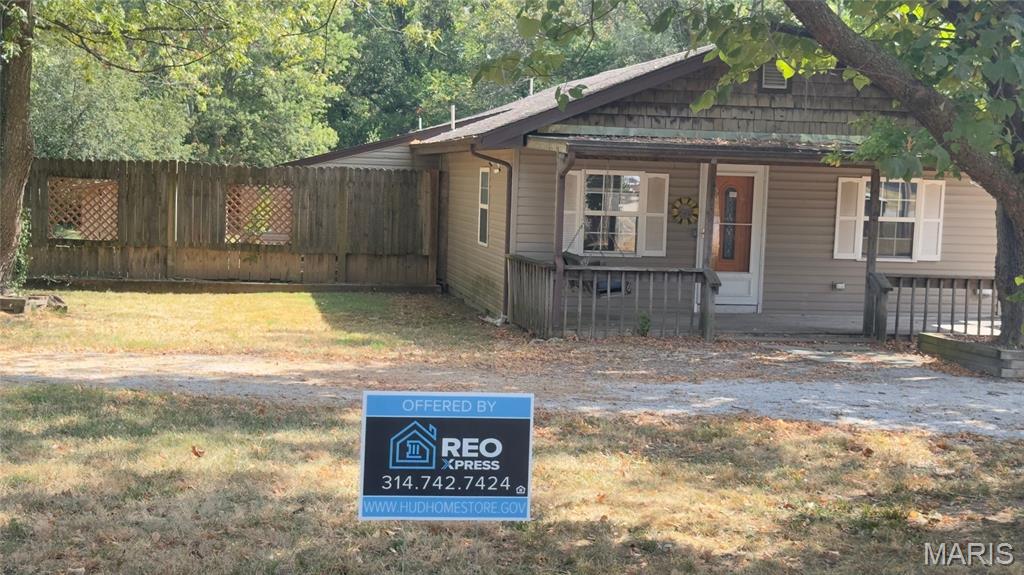 Get the opportunity to own an acre in town! This single-story 4-bedroom, 2-bathroom home at North Homewood Ave features 1,304 sq ft of living space with an open layout, a covered front porch, and a rear deck. Set on a level, wood-fenced 1.06-acre lot with a storage shed, outbuilding. Spacious lot living with city convenience. Schedule your showing today!

Open to all purchasers without preference after bid deadline. HUD homes are Sold As Is. All utilities are turned OFF. Please use discretion when showing and bring a flashlight.