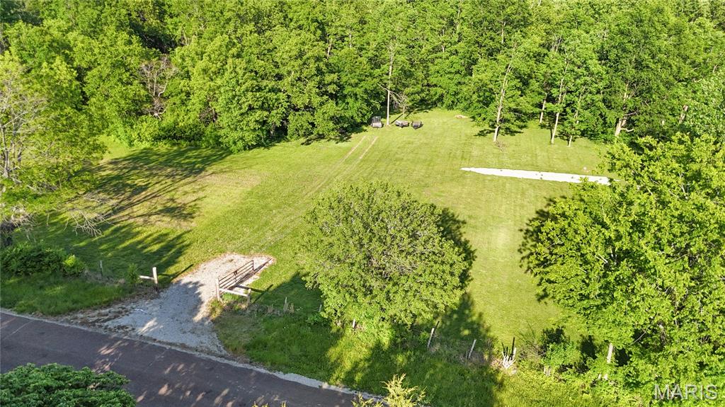 Build your dream home on this beautiful 4 +/- acre lot! Conveniently located off a paved road with easy access — no gravel roads to travel. Enjoy the freedom of no restrictions while still having plenty of space to create the property you’ve been dreaming of. Survey will be completed in 6 weeks.