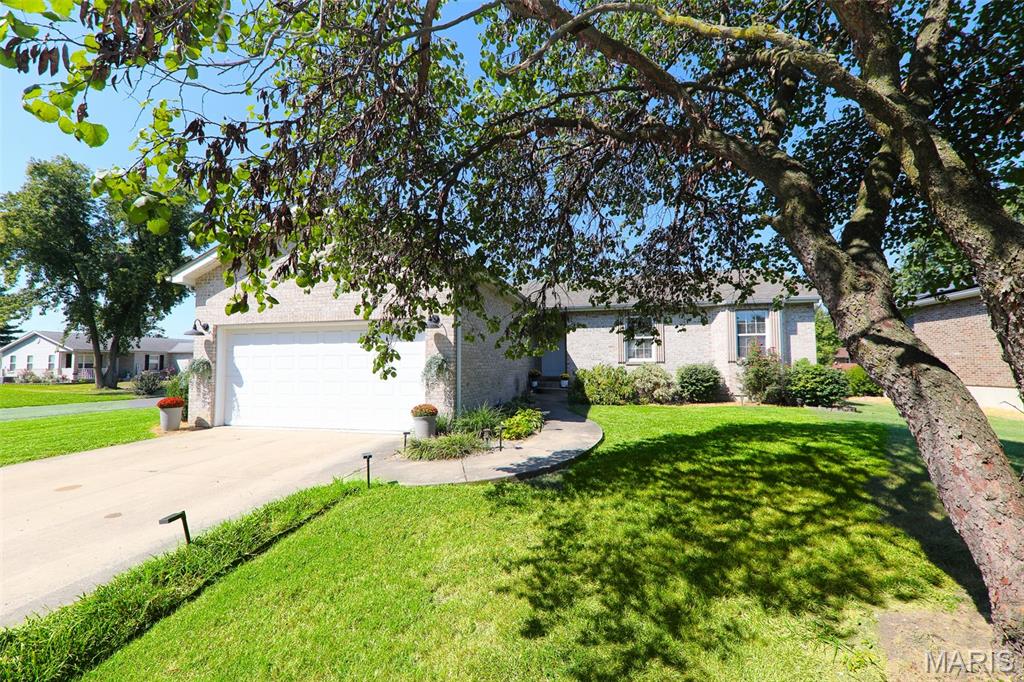 Step into a refreshed lifestyle at 148 Cynthia Lane. This single-family residence, has been completely remodeled, offering a contemporary living experience in a classic ranch architectural style. The recently updated kitchen is a culinary enthusiast's delight, featuring sleek stainless-steel appliances and a convenient pantry for organized storage. Adjacent, the living room provides a welcoming ambiance, centered around a comforting fireplace perfect for quiet evenings or lively gatherings. A thoughtfully designed bathroom includes a spacious walk-in shower, offering a serene and functional space for daily routines. Beyond the interior, a private yard beckons, providing a personal sanctuary for relaxation or recreation. Complementing this, an inviting outdoor living space extends your entertainment options, while an attached garage offers practical convenience. Discover the effortless living that awaits; schedule your private viewing of this remarkable property today.