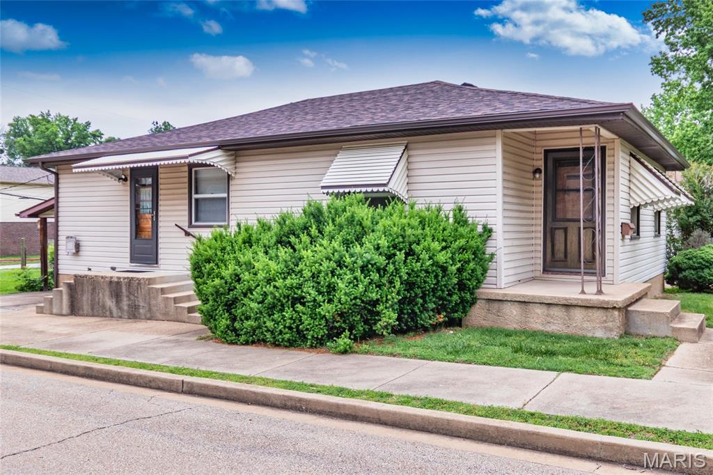 New listing for a charming 3-bedroom, 2-bathroom ranch home in Crystal City, available for the first time since it was custom-built in 1956. Situated on a large lot near the park, pool, and highway, this property offers an exceptional location and excellent structural integrity.

The home features a convenient main-floor layout, including a kitchen with appliances that opens to an adjoining breakfast bar and dinning area. Additional highlights include a carport and a partially unfinished basement (washer & dryer stay) with significant potential for expansion. Key updates include a roof, gutters, and awning replaced one year ago, as well as a furnace and air conditioning units installed three years ago.

While the property requires some TLC, it represents a rare opportunity to own a well-maintained custom built home that has remained in the same family for over 70 years.