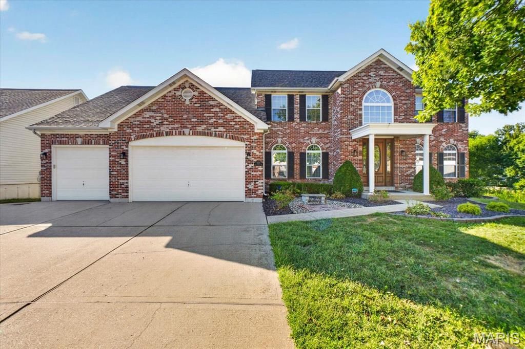 Welcome to this spacious atrium 1 1/2 story home with inground pool, located on a cul-de-sac lot backing to a peaceful lake!  This fabulous home located in Kerth Forest has been loved by its original owners and ready to take on its new ones!  Walking up to this stately home, you will love the full brick front, oversized 3 car garage & driveway, along with new architectural roof.  Around back you will find a fabulous inground pool, screened-in deck, basketball court, and peaceful lake view.  Inside the home is a dramatic two story entry with marble floors, dining room with tray ceiling, and great room with atrium and rear wall of windows looking over pool and lake.  The kitchen features an abundance of 42" cabinetry, granite countertops, stainless steel appliances, custom backsplash, pantry, and spacious breakfast room.  Also on the main floor are the primary bedroom suite with walk-in closet, powder room and main floor laundry.  Upstairs you will find a spacious loft area and two additional bedrooms separated by a Jack and Jill bathroom.  The walkout lower level is fully finished with a wet bar, huge rec area, and another full bath.  There have been many recent upgrades and renovations to the home, a few of them are:  new light fixtures, new ceiling fans (including in the atrium/great room), replaced 8 atrium windows, new window screens, new palm tree in atrium, new fencing around pool, new pool light, newer roof (2026), 2 new A/C units (24-26), new Tigerwood deck (2025), and extensive landscaping & sod.  This remarkable home is truly a MUST SEE!