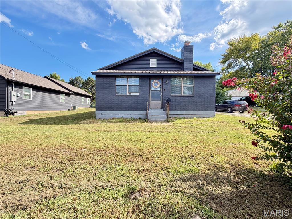 Looking for a home that feels basically brand new without the brand-new price tag? This beautifully updated 3-bedroom, 2-bath brick home offers 1,734 sq. ft. of living space and has been completely gutted to the studs and rebuilt. Almost everything was replaced about 2 years ago, including sheetrock, electrical, plumbing, water lines from the house to the meter, sewer lines to the city, flooring, lighting, HVAC, insulation, kitchen and bathrooms. Updated newer metal roof. The home has a warm, welcoming feel with a wood-burning fireplace perfect for cozy evenings. The large eat-in kitchen features custom cabinets, tons of counter space, a large pantry, stainless steel appliances, subway tile backsplash, disposal and flat-top stove. The huge master bedroom offers lots of natural light, two large walk-in closets and private bath with a walk-in shower, tub and bidet. Outside, enjoy a small deck, fenced backyard and storage shed. Utilities average less than $150/month! Priced to sell—come take a look before it's gone!
