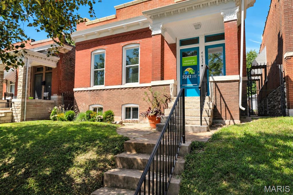 Beautiful renovation from St. Joseph Housing Initiative! This home is available to 1ST-TIME BUYERS, with a household income below 80% of AMI. See disclosures for income limits and details.

This spacious brick bungalow offers easy, 1-level living, and features 2BRs, 2 full baths and a main-floor laundry! With a new white roof, new windows, new systems and new LVP flooring throughout, this one has all the benefits of new construction, with the charm of historic Dutchtown! Highlights include covered porches in front AND back, a newly fenced yard and off-street parking for two cars.
The parking pad features a permeable TrueGridPaver system for easy, all-season use. But wait, there's more! A large, bright basement offers the possibility of more living space and the perimeter is already pre-framed for a potential finish! This is a wonderful block in the heart of Dutchtown, convenient to Grand Ave., Hwy 55 and Carondelet Park. Book your showing today!