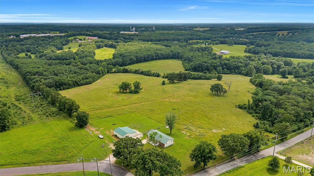 Almost Forty-two acres off Hwy 50, just minutes from Gerald. From the I-44 interchange, you are pulling down Tegeler Road in about 30 minutes. For a primary home, that is a manageable commute. For a second home or a weekend hunting property, it barely registers.

The layout of the land is the first thing that stands out.  Open pasture and mature timber working together the way good farm ground should. The wooded corridors run naturally through the property and create the kind of travel routes deer use consistently. Hunters who know this ground know what that means in November. Whether the next owner runs cattle on the open pasture, puts up hay, or sets stands along those timber edges, the land is already configured for it. This is a true working mini-farm with serious recreational upside built right in. Turkeys are abundant, and the trophy deer have been harvested here.

The shop is like new with updated electric, door openers, windows, metal roofing and sides, and a concrete floor that makes it the kind most people have to build after they move in. Oversized metal building with see-through glass panel overhead doors that pull in natural light across the full floor. Plenty of room for equipment, vehicles, trailers, or whatever the operation demands. Enough room for your duck boat, tractor, and deer camp hangout.  

The house was completely remodeled in 2024. Completely New Kitchen remodel with new wood cabinets and new countertops, a New HVAC system installed, updated electrical and plumbing, including a heated 2-car attached garage and much more.  Upstairs bath has been taken down to the studs and redone with a new shower and an added linen closet. The basement was fully renovated and insulated. Three bedrooms, two full baths on 1,050 square feet of main level living, with finished space below. Brand new septic, June 2026. Every system in this home is NEW OR UPDATED. Buyers walk in ready to LIVE, FARM, and HUNT from day ONE.

The work is done. The land is ready. All that is left is YOU! Tour it today. #Land #FranklinCountyLand #HuntingProperties