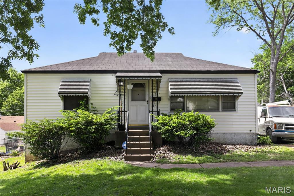 Charming 1950s single-family home located in the established Normandy area of St. Louis County. This well-situated residence at 1941 Farrell Dr offers classic ranch-style living with a functional layout and strong potential for personalization. The home features a traditional footprint with spacious living areas, natural light throughout, and a practical kitchen layout ready for your updates and vision.

Set on a quiet residential street with paved city road frontage, the property provides convenient access to major highways, schools, shopping, and local amenities. The home is served by public utilities including Ameren Missouri electric, Spire natural gas, and county water/sewer services, ensuring reliable infrastructure.

The exterior reflects timeless mid-century construction with a composition shingle roof and generous yard space suitable for outdoor enjoyment, gardening, or future enhancements. Laundry hookups are typically available, offering flexibility for buyer-installed appliances.

Located within the Normandy School District, this property presents an excellent opportunity for homeowners or investors seeking value in a well-connected St. Louis County location.