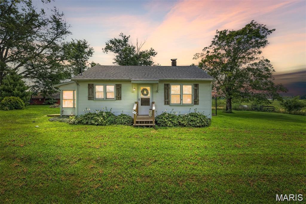 Country charm just minutes from town! This adorable 2-bedroom home offers peaceful scenic views, a spacious level yard, and the convenience of the desirable Farmington School District. Featuring a 3-year-old roof, there’s one less major expense to worry about. Whether you’re looking for your first home, downsizing, or investing, this one is full of charm and potential!
