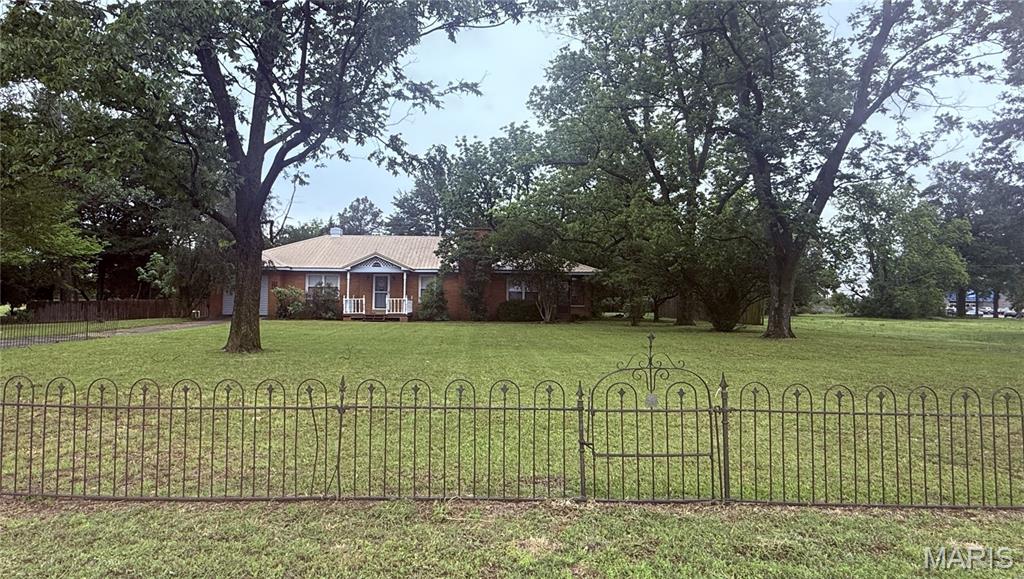 Unique Opportunity Location - This property has a 2007 Sq Ft residence sitting on it. However, it is located among commercially zoned properties. So you may choose to use this for residential or maybe have it zoned for business use. The lot is 1.10 Acres +/-. Walking distance to Walmart. Close to Hwy 84 & 412 Intersection. Use the home for family living, or your personal business, or redevelop for commercial investment. Cash or Conventional Financing.