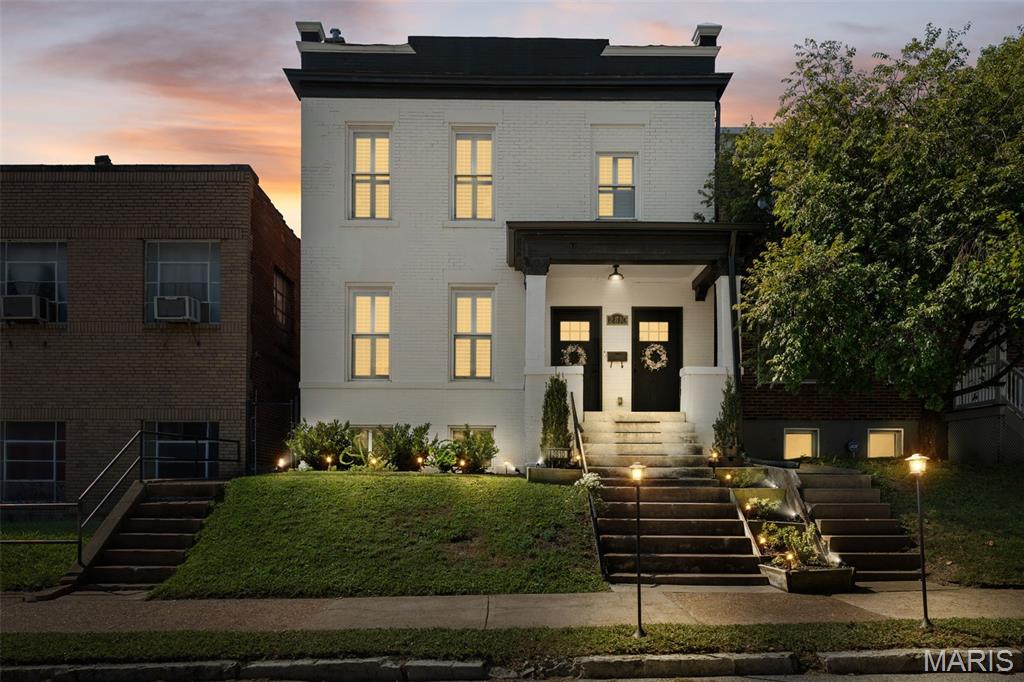 Welcome to 2810 St. Vincent, an elegant Gate District custom renovation showcasing exceptional craftsmanship, thoughtful design, and extensive upgrades throughout. This truly remarkable home beautifully blends old-world charm with modern luxury, featuring an open and expansive floor plan, 10-foot ceilings, exposed brick, and an abundance of natural light.

The extensive list of improvements includes newer windows, roof, concrete work, city garage and a private hot tub for relaxing or entertaining. Inside, wide-plank white oak hardwood floors, gorgeousd light fixtures, recessed lighting, and plantation shutters throughout!

The stunning kitchen features custom soft-close cabinetry, high-end stainless-steel appliances, quartz countertops, and a spacious center island. The luxurious bathrooms showcase custom tile work and high-end fixtures, including the show-stopping marble primary bath with double vanity, deep soaking tub, and separate shower.

This home perfectly blends sophisticated finishes and a seamless combination of historic character, location and modern amenities. Zoned HVAC, convenient second-floor laundry, and a partially finished basement offering flexible space for a home office, gym, recreation area, or additional storage. Located on a quiet street that ends in a cul-de-sac just a few blocks from Lafayette Square, 2810 St. Vincent is a truly exceptional city home.