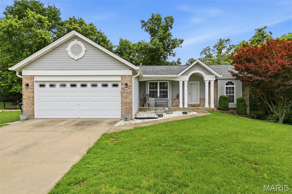 Welcome home to this beautifully maintained ranch in the highly sought-after Doubletree subdivision. This 3-bedroom, 2 bath home offers the perfect blend of comfort, space, and functionality in the award winning Francis Howell School District. Featuring a wooded backyard for privacy and positioned in a cul-de-sac. Step inside to find vaulted ceilings and an open floor plan designed for everyday living and entertaining. Main floor laundry, a spacious 2-car garage, along with a walk-out basement make this home as practical as it is inviting. Conveniently located near highways, shopping, restaurants, and parks, this home truly checks all the boxes for buyers looking for space and an unbeatable location.