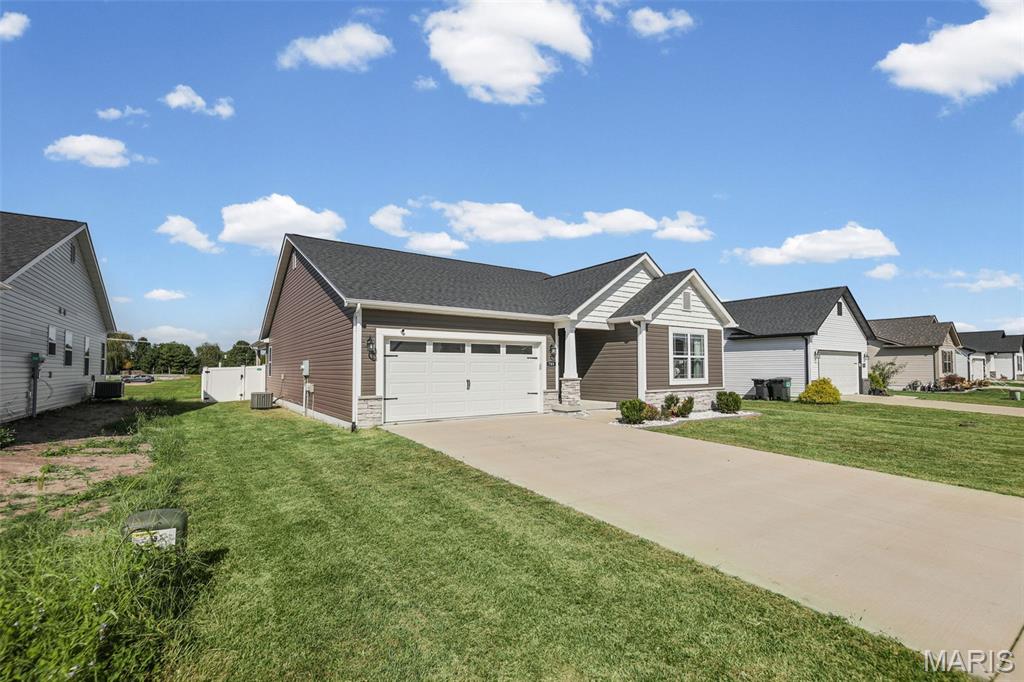 Welcome home to 789 Topaz Court! Tucked away on a quiet cul-de-sac in Mascoutah’s Crown Pointe subdivision, this inviting 3-bedroom, 2-bath ranch offers 1,873 square feet of comfortable living space. The open floor plan features vaulted ceilings and a cozy gas fireplace. The kitchen provides ample cabinetry, granite countertops, a large island, pantry, and easy access to the dining area. The spacious primary suite includes a walk-in closet and private bath with dual vanities, a soaking tub, and separate shower. The full unfinished basement offers an egress window, bathroom rough-in, and plenty of room for future living, recreation, or storage space. Outside, enjoy the covered patio with a white vinyl privacy fence. A two-car garage and main-level laundry complete this move-in-ready home. Schedule your showing today! Buyer to verify all MLS data.
