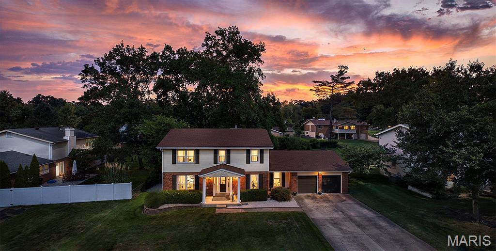 SPACE, VERSATILITY & A BACKYARD YOU’LL LOVE! This impressive 5-bedroom, 4-bath home in Manchester offers an abundance of living space across three levels, a gorgeous sunroom, a scenic backyard, and access to fantastic community amenities. Step inside to spacious living and dining areas, along with a large family room centered around a cozy fireplace. The generously sized eat-in kitchen features stainless steel appliances, abundant cabinetry, and plenty of room for everyday meals and entertaining. A main-floor bedroom and full bath provide excellent flexibility for guests, a home office, or multi-generational living, while main-floor laundry adds everyday convenience. One of the true highlights of the home is the beautiful sunroom, surrounded by windows and overlooking the picturesque backyard. It’s an inviting space for morning coffee, relaxing at the end of the day, or entertaining throughout the year. Outside, an expansive brick patio and gazebo create even more room to gather and enjoy the scenic surroundings. Upstairs you’ll find four bedrooms and two full baths, including an oversized primary suite with two closets. The partially finished lower level adds even more versatility with a spacious recreation area, additional sleeping space, a full bath, and plenty of storage. An attached 2-car garage with additional tandem space completes the home. Beyond the property itself, residents can enjoy an amenity-filled community featuring a clubhouse, swimming pool, tennis courts, recreational facilities, and picnic areas—giving you even more ways to relax, play, and enjoy the neighborhood. With 5 bedrooms, 4 full baths, multiple living spaces, a stunning sunroom, an incredible backyard setting, and outstanding community amenities, this Manchester home offers the space, flexibility, and lifestyle you’ve been looking for.