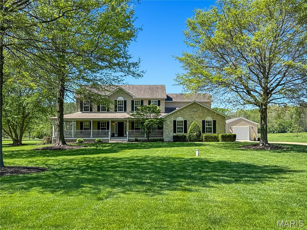 Look No Further! This Stately 2-Story Home sits on 3+ acres in the prestigious Forest Hills Subdivision. The In-Ground Pool boasts an incredible, fenced patio area and offers some of the best sunsets in Franklin County! The mature trees welcome you to the property while the sprawling front porch leads you into the 2-Story Entry Foyer.  You'll be blown away with the grand design of this home with formal dining off foyer, 2 story balcony opening to foyer, and breaktaking Great Room fireplace with incredible wall of windows. The main floor offers some formal design features while still offering an open feel as the Great Room, Breakfast Area, and Kitchen are all connected with access to the pool, patio, and hot tub area. The Kitchen features an island, sink window, large pantry, stainless steel appliances, and solid surface countertops. Located on the main floor, the Primary Suite features a large walk-in closet and suite bathroom with double vanity, soaking tub, and walk-in shower. Upstairs you will find the balcony which connects the 3 additional Bedrooms, Full Bathroom, and additional Living Space or Bonus Room. The Home offers a large Attached Garage in addition to the detached garage, and both are heated & cooled. Full Home Security System. So Many Updates in this well-maintained home. Oh, Did we mention the Backyard Oasis with Fenced Patio, In-Ground Pool, and Large meadow Area?! Yeah, Don't Hesitate on this Custom Home and Schedule Your Personal Tour Today!