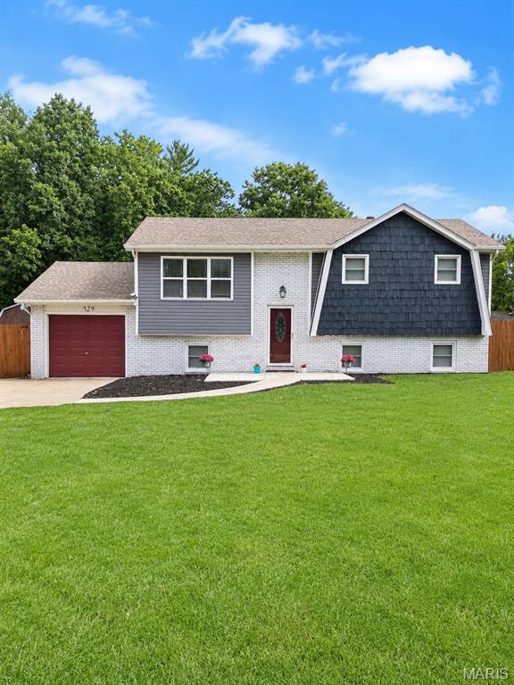 Some homes simply check the boxes—this one exceeds every expectation. Welcome to 729 Albers Lane, where thoughtful updates, abundant natural light, and room to grow come together to create the perfect place to call home.
This beautifully updated, move-in ready 5-bedroom, 2-bath home, with over 1900 square feet of living space has everything you've been searching for. From the moment you walk through the front door, you're greeted by natural light pouring through the windows, creating a bright and inviting atmosphere.
The upper level features a spacious living room, a warm and updated kitchen, three comfortable bedrooms, and a full bathroom. The lower level offers incredible flexibility with a large family room, two additional bedrooms, and a second full bath—ideal for guests, a home office, hobbies, or simply giving everyone room to spread out.
Step outside to enjoy a fully fenced backyard, perfect for entertaining. The attached one-car garage adds convenience, while fresh concrete and beautifully refreshed landscaping create exceptional curb appeal from the moment you arrive.
Located in the highly desirable Bethalto School District, this home is filled with updates, thoughtfully maintained, and truly ready for its next owners to move right in. If you've been searching for a home that offers space, style, and peace of mind, 729 Albers Lane is one you won't want to miss.