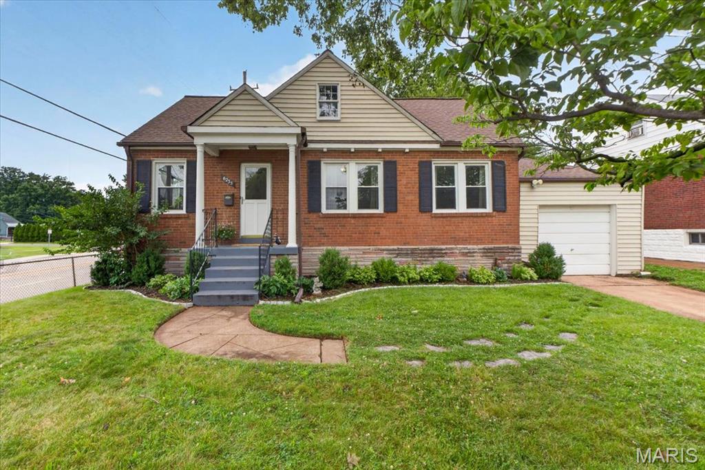 Don't miss this beautifully updated Affton bungalow, where original vintage charm meets modern comfort. Gorgeous solid hardwood floors flow throughout an open living room, dining room, and bedrooms, creating an inviting and functional layout. The updated kitchen impresses with granite countertops, a glass tile backsplash, 42" cabinets, and stainless steel appliances. Two spacious bedrooms and a fully updated bathroom complete the main level, while the full basement offers additional living space and is ready for your finishing touches. Outside, enjoy a fully fenced backyard with a patio, ideal for entertaining or relaxing in privacy. An attached 1-car garage adds everyday convenience, and the location can't be beat. Just minutes from 9 Mile Garden, area parks, and local restaurants!