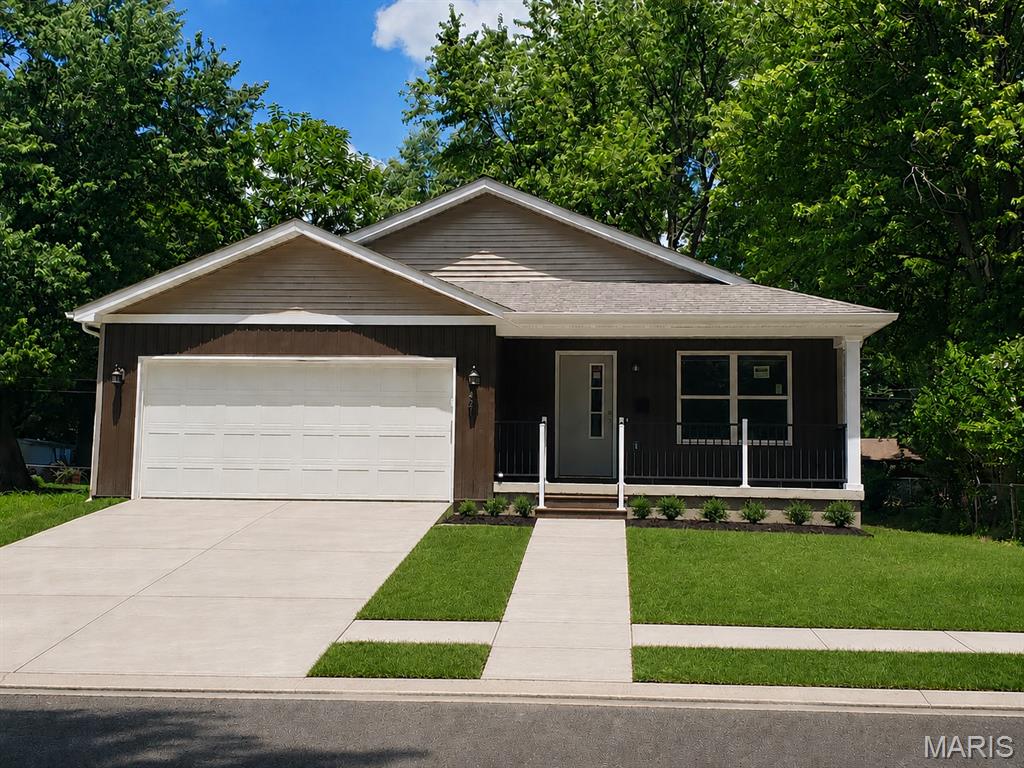 Experience the perfect blend of quality craftsmanship, modern design, and effortless one-level living in this beautifully constructed new home. The thoughtfully designed open floor plan creates an inviting atmosphere ideal for both everyday living and entertaining. At the heart of the home, the kitchen showcases custom cabinetry, granite countertops, and a spacious breakfast bar that seamlessly connects to the living and dining areas. The private primary suite offers a relaxing retreat with a well-appointed corner shower, while the guest bath features a classic tub/shower combination. Designed for comfort and efficiency, the home includes a tankless water heater and energy-efficient systems to enhance everyday living. Best of all, you'll enjoy the confidence and peace of mind that only brand-new construction can provide—simply move in and make it your own