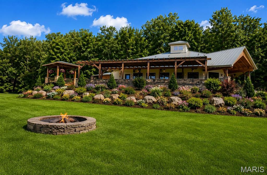 Exceptional opportunity to own a premier, multi-purpose event venue designed to accommodate a wide range of gatherings. This unique property features expansive indoor space complemented by a large covered outdoor pavilion, offering incredible flexibility for events such as weddings, bridal and baby showers, graduation parties, birthday celebrations, family reunions, crafting events, and more. The versatile layout also lends itself perfectly to corporate meetings, trainings, retreats, and more..
The thoughtfully designed open floor plan allows for customizable setups with a seamless transition between indoor and outdoor spaces, creating an inviting and functional atmosphere for both personal celebrations and professional use. Updated finishes, flexible seating arrangements, enhance the overall appeal and usability of the space.
Currently operating as an active wedding venue, the property offers immediate income potential while also providing the opportunity to reposition as a true multi-purpose event center with minimal modifications. The attached bridal suite presents additional value with strong potential for conversion into an Airbnb, particularly given its proximity to the popular wineries of St. Francois County.
With strong income-producing potential and a highly attractive price point, this is a rare investment opportunity. The combination of location, versatility, and future growth potential makes this property an exceptional offering for investors or entrepreneurs seeking a distinctive, revenue-generating venue.