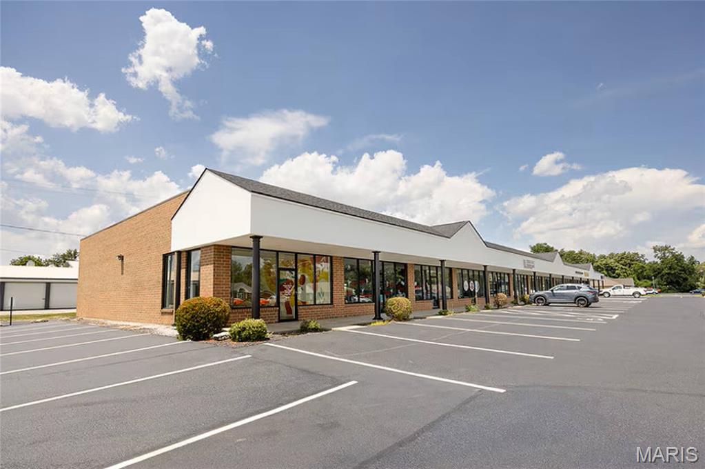 Prime commercial leasing opportunity in O’Fallon, IL! Multiple suites available ranging from approximately 1,200 to 2,400 square feet, including a double suite and a highly visible corner suite. Lease rates range from $14.00-$15.00 per square foot annually (NNN), with tenants responsible for utilities. This well-maintained property offers excellent visibility in a high-traffic location, ample parking, handicap accessibility, dual front and rear entrances, private restrooms, private offices, and reception areas, making it ideal for a variety of professional, retail, or service-oriented businesses. Conveniently located just minutes from Interstate access, the property provides outstanding connectivity for clients and employees alike. All available suites have passed City of O’Fallon inspections, including fire extinguisher servicing, have current occupancy permits, and are truly move-in ready. Immediate occupancy available. Contact listing agents for additional information or to schedule a private tour.