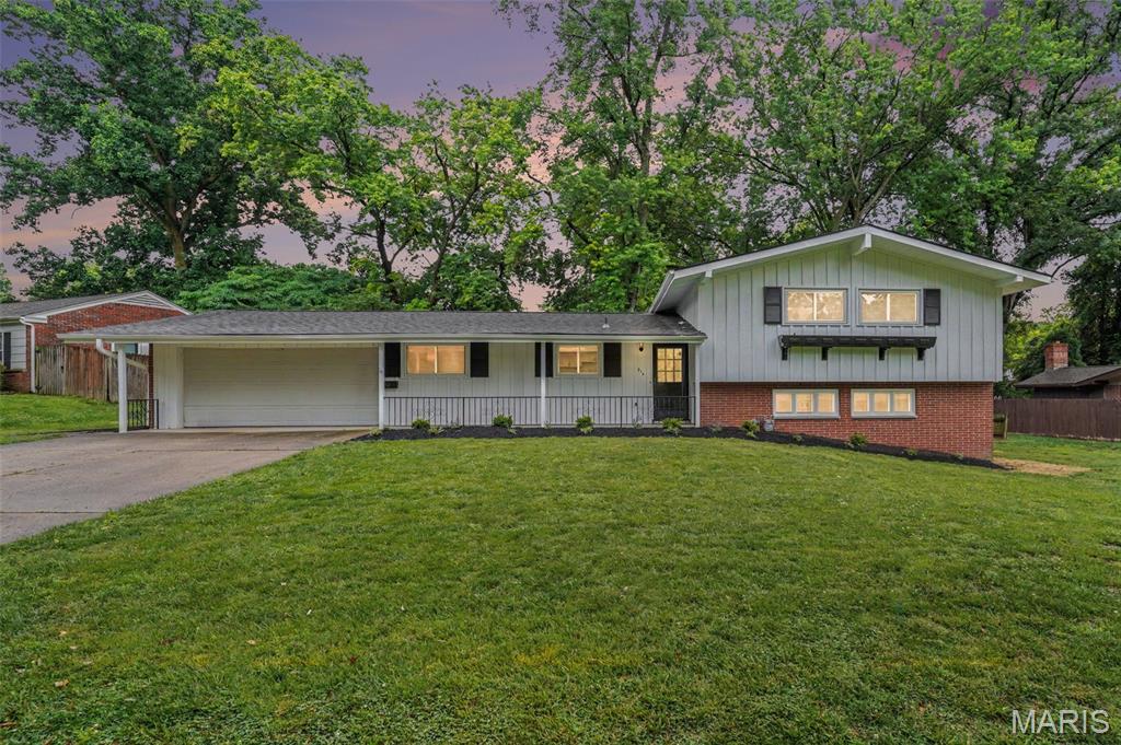 Welcome home to this beautifully remodeled tri-level offering space, flexibility, and major updates throughout! Featuring vaulted ceilings, all new flooring, a brand-new roof, HVAC system, and water heater, this home is truly move-in ready. Inside, you'll find two spacious living/family rooms, providing plenty of room for entertaining, relaxing, or creating the perfect recreation space. With two possible primary suites, including one with access to a charming three-seasons room, this layout offers endless possibilities for multi-generational living, guests, or a private retreat. The home features three full bathrooms for added convenience. Outside, enjoy the large, level backyard complete with a patio, perfect for entertaining, relaxing, or enjoying outdoor activities. This beautifully updated home combines comfort, versatility, and modern upgrades! All that's missing is you!