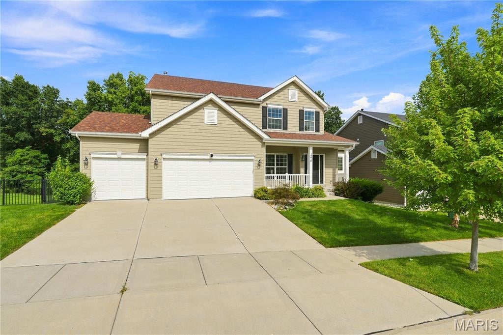 Exceptional McBride-built 1.5 Sty located in the premier Chesterfield community of Fienup Farms. This popular “Pin Oak” model features an open light-filled layout with soaring ceilings, detailed trim work and large windows that offer continuous wooded views throughout the home’s interior. Welcoming covered front porch leads to formal dining room and stunning great room highlighted by a dramatic wall of windows. Designer kitchen with 42” white Shaker cabinetry, Helix quartz countertops, premium stainless steel appliances & 7’ center island adjoins bright breakfast room with sliding glass door that opens to deck. Spacious primary bedroom suite with luxury bath offers an appealing retreat. The 2nd floor extends the living quarters with 3 additional bedrooms, 1 with ensuite bath & 2 with Jack n’ Jill bath. The walk-out Lower Level provides an ideal space for both everyday living and effortless entertaining with an expansive recreation room & game room plus office, hot stone steam sauna, 5th bedroom and full bath. Situated on a premium wooded lot with composite deck, covered & open flagstone patios surrounded by built-in seating, fully fenced backyard & oversized 3-car garage with Tesla EV charger. Fienup Farms offers a vibrant lifestyle with 26-acre lake, pickleball courts, playgrounds, walking trails and beautifully maintained green spaces. Award-winning Rockwood School district.
