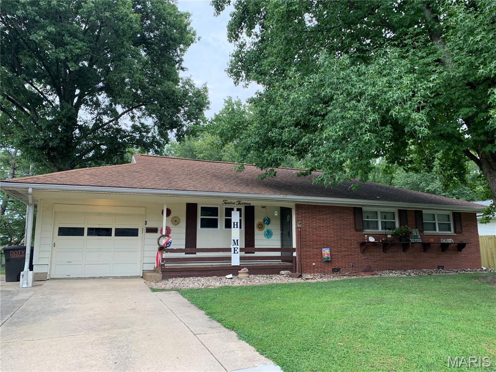 Recently updated ranch-style home in a desirable location close to schools and parks. This inviting property features an attached garage, welcoming front porch, comfortable living room, and a separate family room with a cozy fireplace—perfect for relaxing or entertaining. The large living room was recently updated with all-new drywall, windows, carpet, and lighting. The kitchen offers new countertops, a new sink, tile backsplash, and appliances that will stay with the home. All bedrooms are spacious and include ample closet space. The hall bath was remodeled in 2024 with a new shower, vanity, flooring, toilet, and fixtures. The primary bath was remodeled in 2023 with a new shower/deep tub, vanity, flooring, toilet, and fixtures. Additional updates throughout the home include new flooring, trim, doors, and a new furnace and A/C installed in 2020.