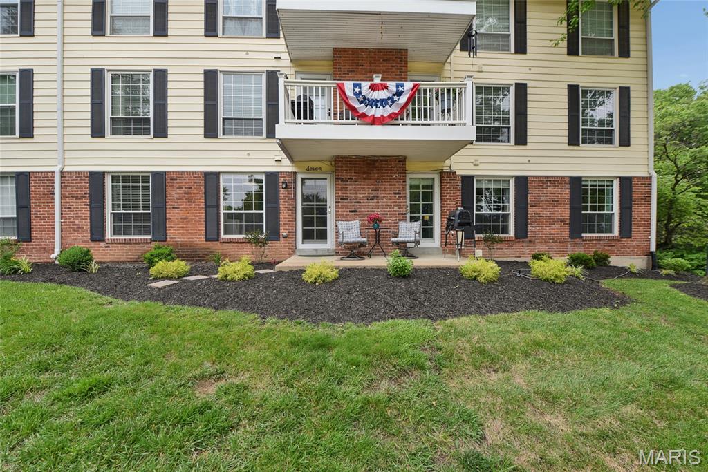 Enjoy easy living in this beautiful UPDAATED ground floor 2 bedroom, 2 bath condo set on a cul de sac within a serene, parklike setting. Step inside to a bright and inviting layout featuring fresh paint, newer carpet and wood-like flooring and newer systems. The large living/dining room boasts crown molding, gas fireplace with marble surround and door to covered patio. A study/office adjoins the living room. The updated galley kitchen boasts quartz counters, glass tile backsplash plus newer appliances and breakfast bar. Owners’ suite features a walk-in closet, ensuite bath with double vanities and separate shower. Second bedroom with Murphy bed, built-in desk and walk-in closet. Updated hall bath with tub/shower. Assigned garage parking with private storage. Ground floor, end unit viewing lush grounds. Walk to shops and restaurants. See amenity sheet for all the updates and extras.