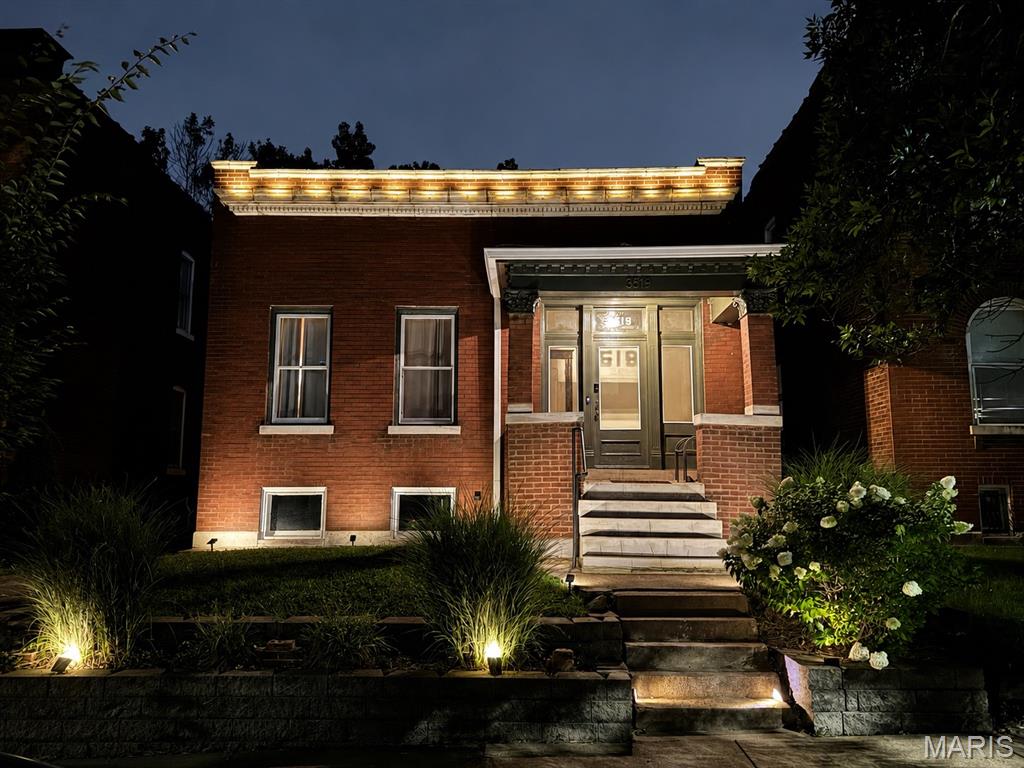 Stunning 2 Bed, 2 Bath Renovation in Tower Grove South! This beautifully renovated brick bungalow blends historic charm with modern updates throughout. A covered front porch welcomes you into an inviting entry foyer featuring refinished original hardwood floors, leading into an open living space with recessed lighting and a classic original fireplace. The adjoining bedroom suite offers a double-door closet and private full bath with timeless subway tile. The dining area flows seamlessly into the beautifully updated kitchen featuring granite countertops, stainless steel appliances, breakfast island, and pantry. Down the hall, the second full bath offers a tiled shower surround, while the additional bedroom features a double-door closet and direct access to the rear of the home. Step outside to the spacious rear deck overlooking a large, shaded, fully fenced yard—perfect for relaxing or entertaining. The partially finished walk-out lower level adds valuable additional living space, offering a versatile area that could be used as a family room, home office, workout space, or entertaining area, along with additional storage. Major improvements updated plumbing, electrical, and HVAC systems. Prepare to be surrounded by an incredible mix of local restaurants, coffee shops, bars, boutiques, and neighborhood businesses along South Grand and Morgan Ford. Tower Grove Park is just minutes away, offering trails, athletic fields, tennis/pickleball courts, community events, and the popular Tower Grove Farmers’ Market. This is a fantastic opportunity to own a thoughtfully renovated home in Tower Grove South!