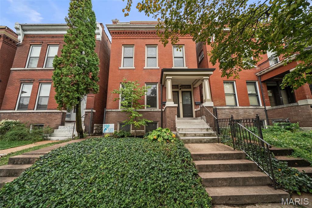 OPEN THURS 4-6pm. Here’s your chance to snag a rare, spacious, and updated duplex in the always-popular Forest Park Southeast- known as THE GROVE.
Whether you’re an investor looking for a true turn-key property or an owner-occupant ready to offset your mortgage, this one checks all the boxes. Each unit offers 2 bedrooms, in-unit laundry, updated kitchens and baths, generous living spaces (more than 1400 squares in each unit), and hardwood floors throughout. The kitchens have updated layouts with stainless steel appliances, dishwashers, and breakfast bar seating.  While units have lots of new, the original character still shines through — in its shell, bones and checkout the original fireplaces! The lower unit is vacant and ready for immediate occupancy. City occupancy inspections have already been completed & passed for both units, giving you the extra peace of mind to move in from day one. The upstairs unit offers a similar layout and updated finishes with a few unique touches of its own. Out back, enjoy rear decks, a fenced yard, and one parking spot. TPO Roof 2020!!!  What about the location you ask? Hard to beat. Perfect for commuters, medical district professionals, bikers, walkers, and anyone who wants to be steps from some of the best restaurants, nightlife, and neighborhood energy The Grove has to offer. These large, updated duplexes with an available unit in The Grove don’t come around often — and this one is ready for you. Come quick!