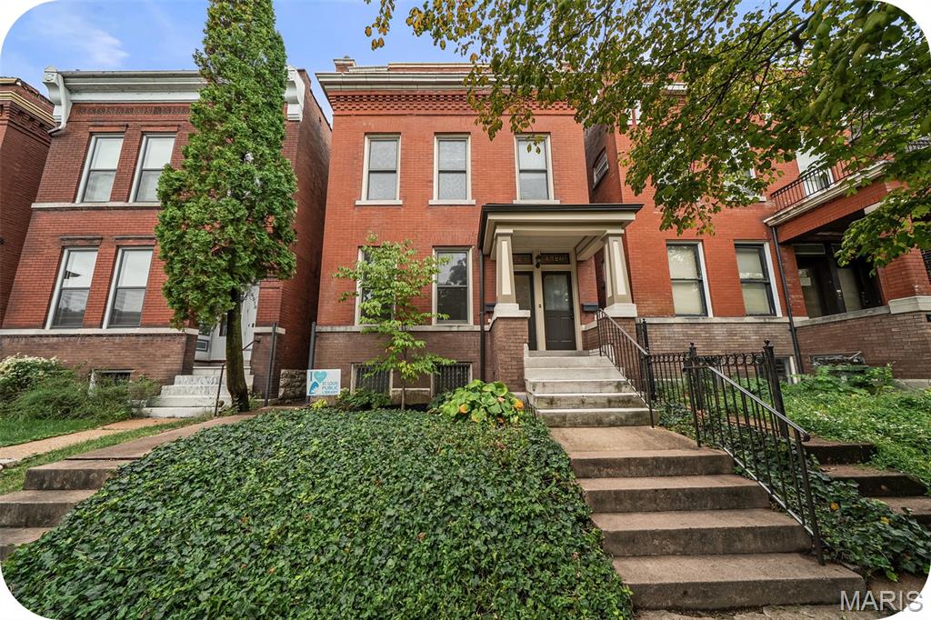 Here’s your chance to snag a rare, spacious, and updated duplex in the always-popular Forest Park Southeast- known as THE GROVE.
Whether you’re an investor looking for a true turn-key property or an owner-occupant ready to offset your mortgage, this one checks all the boxes. Each unit offers 2 bedrooms, in-unit laundry, updated kitchens and baths, generous living spaces (more than 1400 squares in each unit), and hardwood floors throughout. The kitchens have updated layouts with stainless steel appliances, dishwashers, and breakfast bar seating.  While units have lots of new, the original character still shines through — in its shell, bones and checkout the original fireplaces! The lower unit is vacant and ready for immediate occupancy. City occupancy inspections have already been completed & passed for both units, giving you the extra peace of mind to move in from day one. The upstairs unit offers a similar layout and updated finishes with a few unique touches of its own. Out back, enjoy rear decks, a fenced yard, and one parking spot. TPO Roof 2020!!!  What about the location you ask? Hard to beat. Perfect for commuters, medical district professionals, bikers, walkers, and anyone who wants to be steps from some of the best restaurants, nightlife, and neighborhood energy The Grove has to offer. These large, updated duplexes with an available unit in The Grove don’t come around often — and this one is ready for you. Come quick!