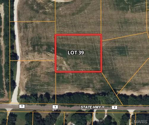 Beautiful and spacious 1+ acre lots available in the desirable McMorland Acres community, located in St. Paul, MO. These prime parcels are perfect for custom-built homes and offer the flexibility to bring your own builder to create your dream home. Enjoy the convenience of public utilities, including water and sewer services, making for an easy and efficient building process. The lots are located in a peaceful, yet easily accessible area, just moments from Hwy 70, providing quick access to surrounding areas, shopping, dining, and more. Whether you’re looking for a quiet retreat or a place to build a family home, McMorland Acres offers a fantastic setting to suit your needs. Additional Rooms: In Platted Subdv.