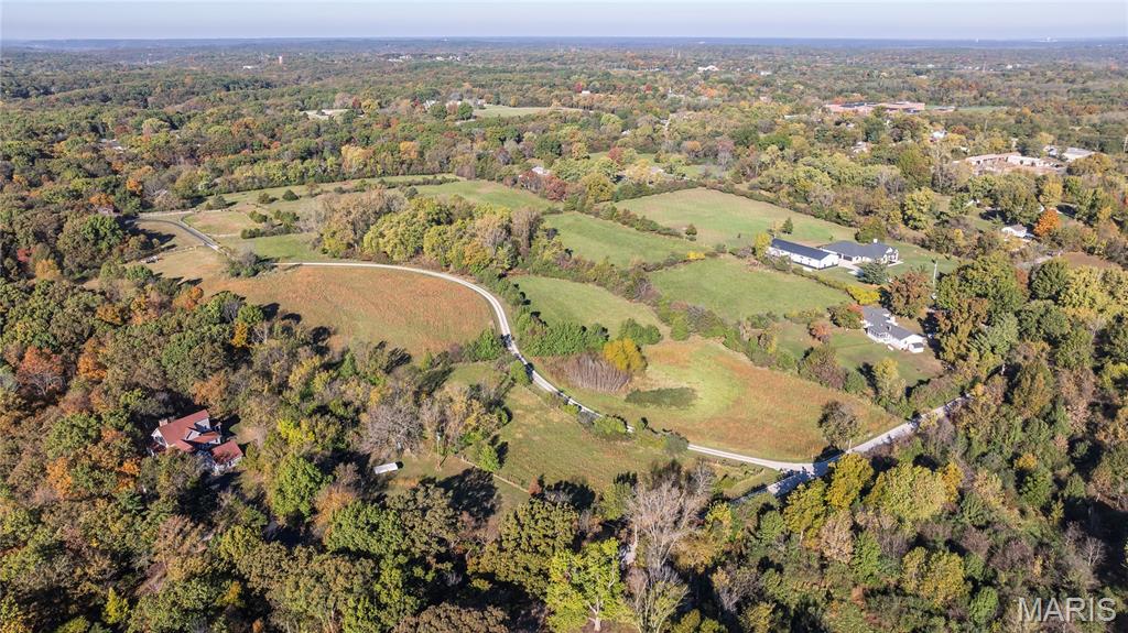 Introducing Bendick Estates — an exclusive collection of just 15 estate homesites in the heart of Wildwood, where luxury living begins with the land itself! Spanning approximately 3 to 5 acres, each homesite offers a rare canvas to design and build a legacy residence surrounded by mature trees, rolling landscape, and protected green space. This thoughtfully curated development was designed to honor the natural beauty of the property while creating a sense of quiet seclusion. Generous spacing between homes and select homesites bordering Rockwood Reservation provide a serene, wooded backdrop that feels both private and enduring. Lots are offered separately, allowing buyers the opportunity to secure their homesite and build intentionally. Partner with Whalen Custom Homes to craft a fully custom residence—whether inspired by one of their existing plans or designed from the ground up to reflect your vision, lifestyle, and level of finish expected at this price point. With completed homes anticipated in the $2M+ range, this is a rare opportunity to create something truly exceptional. For those who have been waiting for the right setting to build their dream home, the time is NOW! Listing price is for Lot 10 - a 4.02 acre walk-out lot.