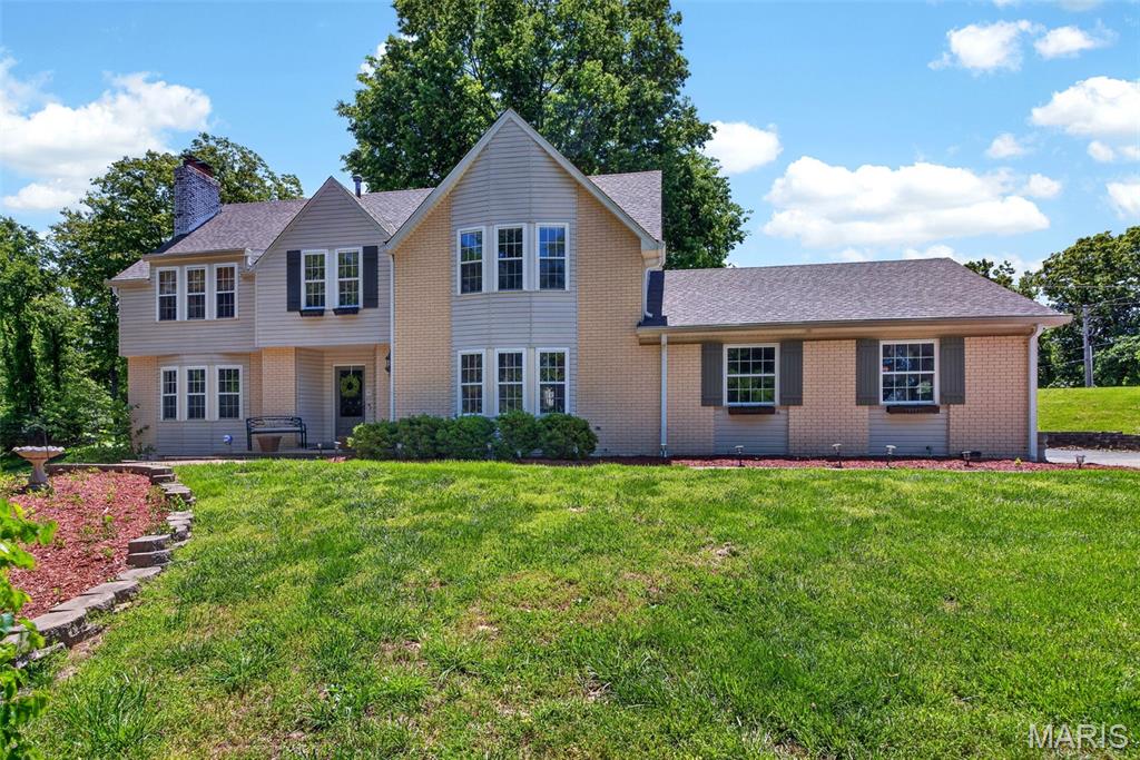 This Wonderful Wildwood 4 bedroom, 4 full & 1 half bath home has over 3500 square feet of living space. It is located on a secluded lot, with a long, private driveway. Over 3 gorgeous acres, about half wooded and half level ground. A crystal clear blue pool also enjoys privacy from any neighbors view.  The main floor has several large gathering spaces, a half bath too. Stainless appliances and granite counters grace the chef’s kitchen. Near the back door is a full bath and laundry room, very convenient to the pool area. Upstairs, a large primary bedroom has a fireplace and an updated ensuite bath. 3 more generously sized bedrooms and a full bath complete this floor. The walk-out lower level has had significant renovations done. New waterproofing system (with transferable warranty), sump pit with pump and new flooring in April 2026.  Roof and Gutters were replaced in October 2025. HVAC is only 10 years old. An oversized garage has room for all your extra lawn and pool equipment!  Located in the award winning Rockwood School District, it is just minutes to Lafayette High School. This beautiful homestead feels miles away, but is close to shopping and entertainment. New Carpet June 2026!
