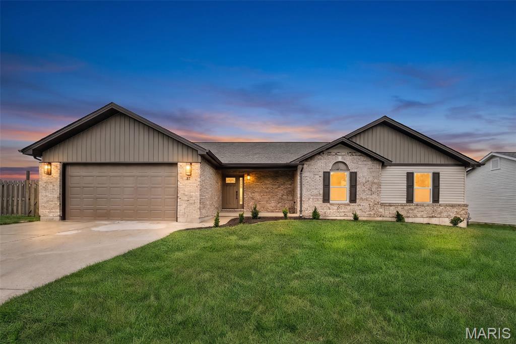 Welcome to turn-key, stress-free living at 87 Beretta Ct, Wright City, MO 63390! This home was taken down to the bare framing studs and rebuilt, inside and out—from the roof, trusses, and drywall to the plumbing, electrical, fixtures, and designer finishes—and is brand new, offering the peace of mind and quality of a new-construction build without the wait.

Step inside to a bright, open-concept main floor featuring vaulted ceilings, natural light, custom arched transitions, and a warm fireplace with a floor-to-ceiling brick surround. The chef-inspired kitchen is appointed with crisp white shaker cabinetry, quartz countertops, a stylish tile backsplash, stainless steel appliances including a gas range, accent pendant lighting, and a cozy bay breakfast nook overlooking the backyard. The main-floor primary suite serves as a true private retreat, complete with vaulted ceilings, a large walk-in closet, and an elegant ensuite bath outfitted with double vanities, stylish gold hardware, and a fully tiled walk-in shower.

One of the standout features of this dramatic update is the newly finished lower level, which substantially increases the overall functional square footage of the home. Designed with a sleek black exposed joist ceiling for a modern industrial-chic aesthetic and lined with durable luxury vinyl plank flooring, this versatile basement includes a spacious recreation space. It also offers a legal 4th bedroom with proper egress and a dedicated, custom-tiled full bathroom—making it the ideal setup for a guest suite, in-law quarters, or a private home office.

Nestled on a quiet cul-de-sac lot, this move-in ready home offers unmatched everyday convenience. You are located just minutes from Wright City R-II schools, the Scenic Regional Library (Wright City Branch), and quick access to I-70 for an easy commute throughout Warren and St. Charles counties.

Schedule your private showing today and be the first to live in this virtually brand-new masterpiece!