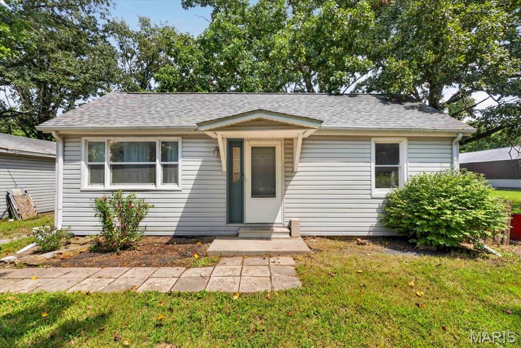 Welcome home to this charming 2-bedroom, 1-bath home situated on nearly an acre (.95 acres) in Freeburg! Offering a peaceful setting with plenty of outdoor space, this property is highlighted by its own pond, creating the perfect backdrop for relaxing evenings, fishing, or simply enjoying the view. Inside, you'll find a comfortable and functional layout with plenty of potential to make the space your own. The spacious lot provides room for outdoor entertaining, gardening, pets, or future possibilities. Enjoy the privacy and tranquility of country-style living while still being conveniently located near everything Freeburg has to offer. Whether you're searching for your first home, looking to downsize, or wanting a property with a little extra land, this one is definitely worth a look!
