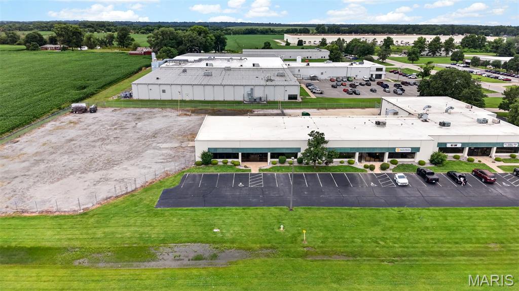 DON'T MISS THIS income-producing property... 21,600 SF Office/Warehouse building with new partial fencing located in Northgate Industrial Park on 3.67 acres. Currently, the building space tenants include Sachs Electric Company, United Steelworkers & St. Louis Thermal Spray & Grinding. There is a LEASE available immediately for a portion of the building, an 8,150 sq. ft. Warehouse/Office space with an additional 1.5 acre outdoor gated area, please refer to MLS# 26057099 for further details. Northgate Industrial Park is also home to Gateway Packaging, Ehrhardt Tool and Machine, Mazzella, ProAmpac, Chestnut Healthcare and Heidtman Steel to name a few. Great location, less than 10 minutes from St. Louis, I-255 & I-270. Set up your appointment today, please allow ample time for approval to enter ALL TENANT spaces! Before making an offer on any property, buyer should independently verify all MLS data, which is derived from various sources and not warranted as accurate.
