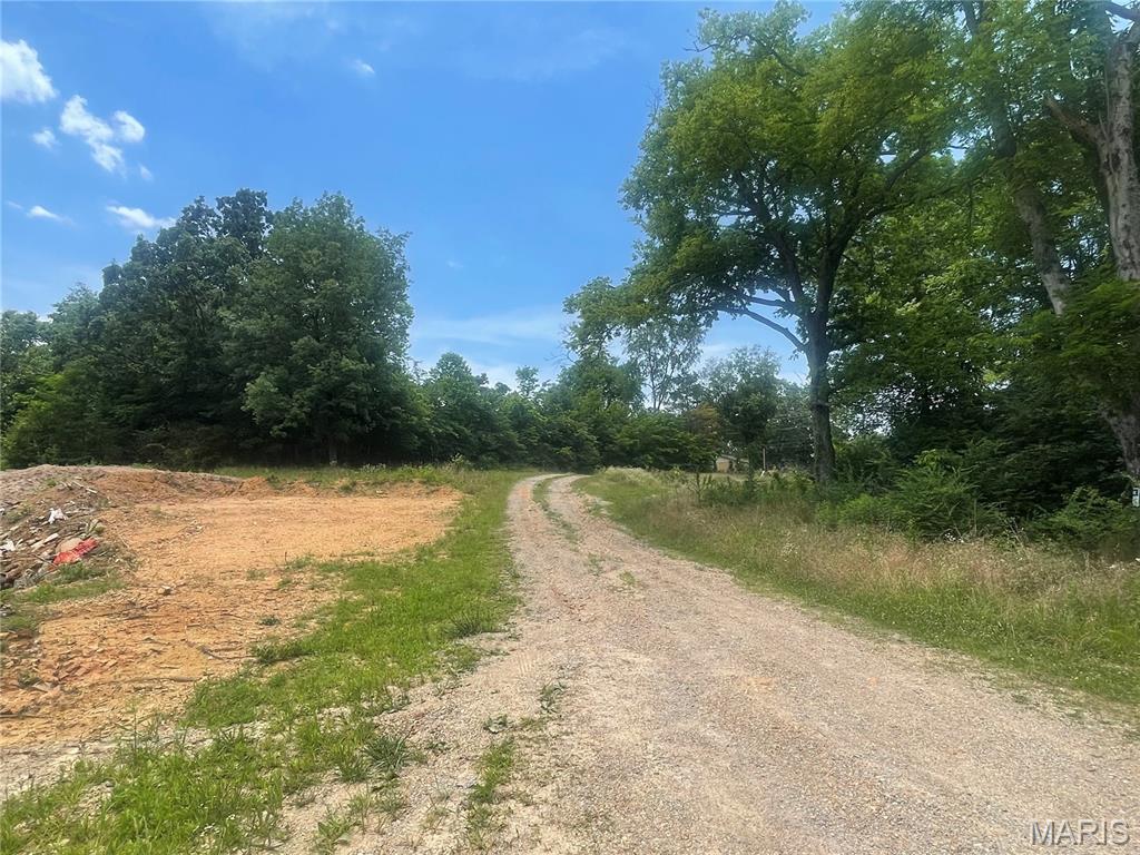 ATTENTION CONTRACTORS!!!!!! How would you like to own a part of the historical brick mill property on North Main Street?  This 8.6 acres of property was originally zoned RS-2, General Residential but is now currently zoned C-1, Neighborhood Commercial.  Property could possibly be changed back to Residential and used to develop a subdivision with a variance.  Also there are endless possibilities for commercial use.  Pickleball courts, batting cages, etc.  This is a lot of vacant land and inside the city limits.  Give me a call to schedule a showing.