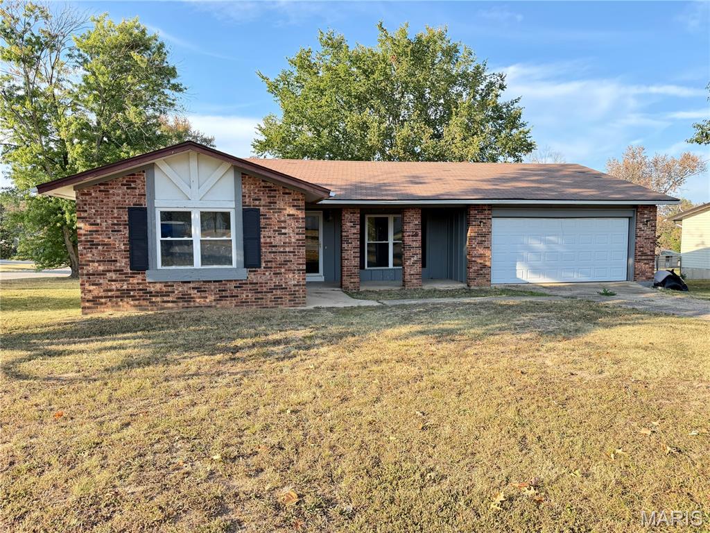 Cozy and updated brick-front ranch home offering 3 bedrooms and 1.5 bathrooms in a great neighborhood! Conveniently located within walking distance of the city park and pool and just minutes from Salem R-80 High School. Numerous updates make this home move-in ready, including updated electrical and plumbing, plywood subflooring, new flooring throughout, carpet in the bedrooms, and luxury vinyl plank flooring in the kitchen, dining area, bathrooms, and laundry room. Updated light fixtures and fresh paint add to the appeal, with the seller planning to complete a few finishing touches soon, including installing door handles and completing select light fixture updates. Enjoy a covered front porch, attached two-car garage, and desirable corner lot. The large, level backyard features a small deck and plenty of room for outdoor entertaining, play, or relaxing. Schedule your private showing today!