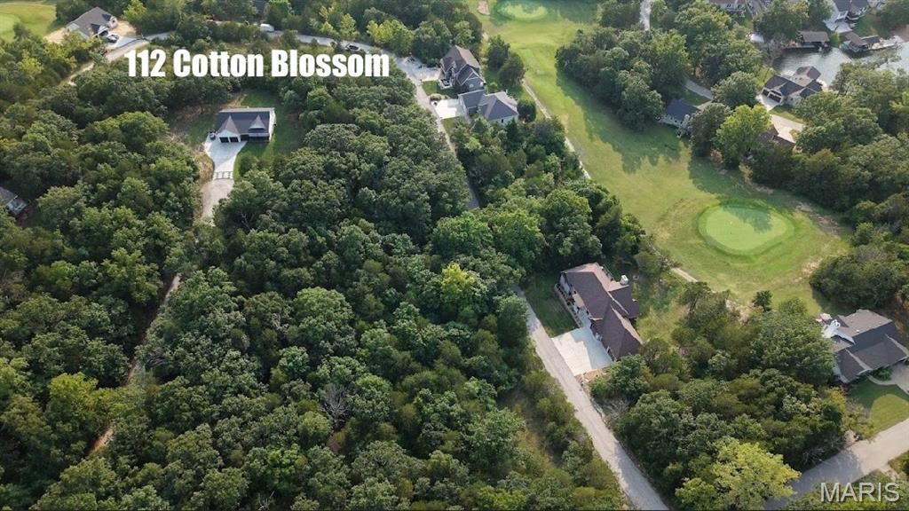 Builders Package with Utilities: Right down from the Big Lake, Golf Course, & New Construction! Buy as an individual lot for lake access or check out the neighboring lots to purchase as a package and save, save, save! These ready-to-build home sites and buildable lots are located in this private, gated, resort-style community with breathtaking views four lakes, a white, sandy beach area, golf course, campgrounds, swimming pool, fitness center and more. Perfect for builders planning to build several homes at once or to anyone seeking a peaceful, recreational lifestyle away from St. Louis, but still very close for easy family visits. Also perfect for get-away lake home. Enjoy the golf course, lake, boating, fishing, clubhouse, pool, etc. ! Just 20 minutes from The Heart of Saint Louis! 
Builders Package:

Developers Paradise: 
Can be combined with:
112 CottonBlossom (Sub Golf Course Lot)
165 CottonBlossom (Golf Course Lot)
166 Cotton Blossom (Sub Golf Course Lot) 
185 CottonBlossom (Golf Course Lot)
9633 Magnolia (Golf Course Lot)  
5724 Treebrook (Golf Course Lot) 
5728 Treebrook (Golf Course Lot)
5736 Treebrook (Golf Course Lot) 
5740 Treebrook (Golf Course Lot) 

& More!