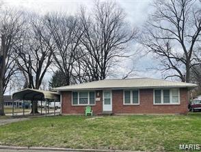 Three bedroom, one bath brick home. Level lot and off street covered parking. Separate kitchen and dining room. Large living room. Carport Conveys with the sale. Storage shed belongs to the current tenant.