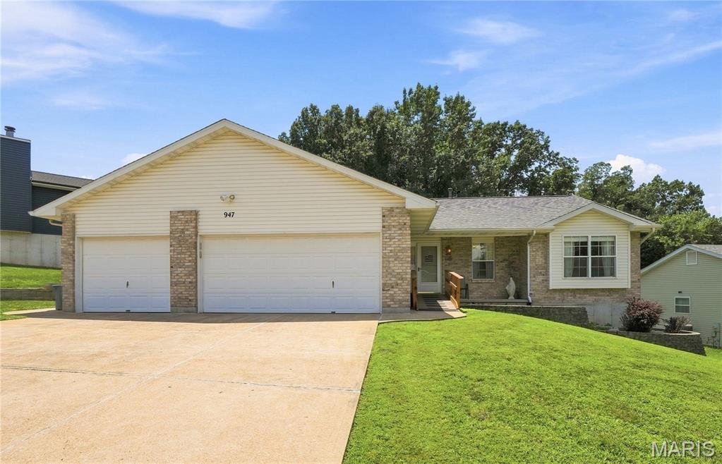 WELCOME HOME! Conveniently located just minutes from the highway, this well-maintained 3 bedroom, 2 1/2 bath ranch offers an open floor plan, generous living spaces, and the perfect opportunity to make it your own.  The spacious great room features a vaulted ceiling, creating a warm and inviting gathering space for family and friends.  The kitchen, complete with a gas range, flows into the breakfast room, where French doors lead to a covered patio overlooking peaceful wooded common ground, an ideal setting for relaxing, entertaining, or simply enjoying the backyard. The primary suite offers a large walk-in closet and a spacious bath with a walk-in tub and separate shower.  Two additional generously sized bedrooms and a full bath complete the main level.    The walkout lower level offers outstanding potential for future finishing, with room for a family room, recreation area, or additional sleeping rooms.  A half bath is already in place, making future expansion even more convenient.  Additional features include a main-floor laundry room, mudroom, and an oversized 3-car garage that has been extended in length to accommodate a trailer or provide extra storage.  The garage also includes a built-in workbench and an electric heater that is currently not operational.  Lovingly lived in and meticulously maintained over the years, this home offers a solid foundation with plenty of opportunity to add your own cosmetic touches.  While new flooring would enhance the home's appeal, major improvements have already been made, including a brand-new roof in 2025.  If you're looking for a quality home with great bones, a fantastic floor plan, and the chance to personalize it to your taste, this is one you won't want to miss!