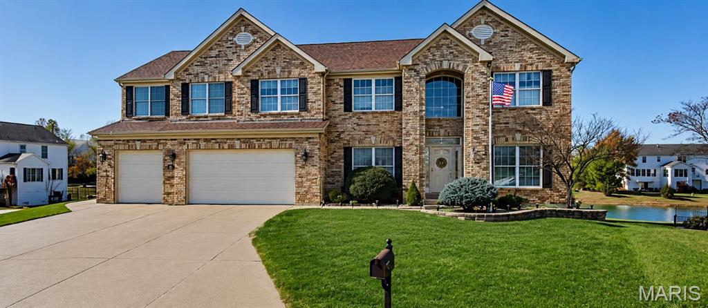 Experience this meticulously maintained 5-bedroom, 4.5-bath home offering more than 6,000 square feet of finished living space on a premium cul-de-sac lot in the highly sought-after Villages at Bainbridge – Lakeshire Village.
From the moment you enter the 2-story foyer showcasing the dining room, sitting room, you'll appreciate the spacious floor plan, beautiful hardwood flooring, and walls of windows that frame lots of natural light The impressive great room serves as the heart of the home, showcasing amazing views, custom lite built-in bookcases, and a beautiful fireplace that anchors the room while creating a warm and inviting space for everyday living and entertaining. Adjacent to the great room a beautiful sunroom where you can relax and enjoy panoramic lake views and spectacular sunsets year-round.
The chef's kitchen is designed to impress with quartz countertops, a large center island, stainless steel appliances, 42-inch cabinetry, an incredible walk-in pantry, and convenient main-floor laundry. And bedroom on the main. Whether preparing meals for family or entertaining a crowd, this kitchen offers both style and functionality. The thoughtfully designed layout includes two primary suites, offering comfort, privacy, and flexibility for family and guests. Bedrooms 3&4 with a jack & jill and loft area has plenty of space for everyone.
The finished lower level expands your living space with abundant storage, Family room, kitchenette, full bath, a private office overlooking the pool and lake, and a remarkable multi-purpose workshop that is a dream space for woodworking, hobbies, crafting, fitness equipment, or future customization.
Step outside to your own private retreat featuring a beautiful in-ground pool, extensive patio space, and a maintenance-free composite deck. Whether you're hosting family and friends, enjoying a quiet morning coffee, or taking in the evening sunsets over the water, this outdoor living space offers an exceptional setting for relaxation and entertainment.
Additional features include a 3-car garage, 9-foot pour foundation, extensive storage throughout, mature landscaping, irrigation system and one of the most desirable lake-view settings in the community.
 Enjoy lakeside living with multiple lakes a community pool. This exceptional property combines luxury, comfort, recreation, and breathtaking views in a setting that truly feels like home.