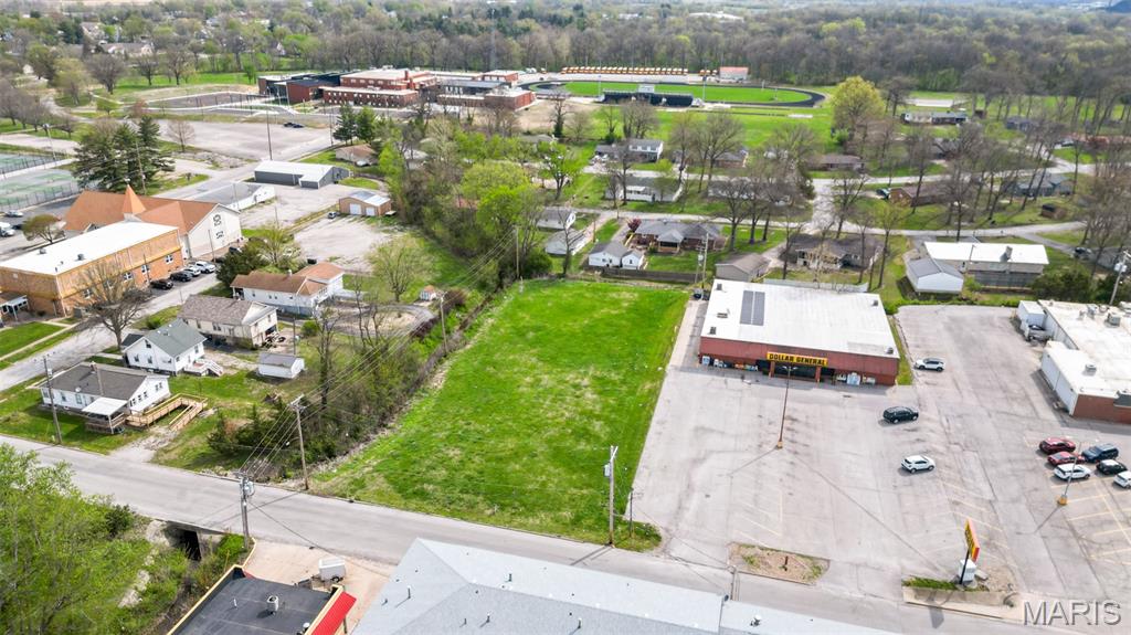 Major Price Reduction to Just $25,000! LOCATION, LOCATION, LOCATION! Prime 0.89 +/- acre commercial lot offering outstanding visibility with an average daily traffic count of approximately 1,750 vehicles per day. Ideally located in the heart of town, directly north of Dollar General and IGA Grocery Store, and just blocks from Hillsboro's new High School and Junior High School. This highly visible site offers an excellent opportunity for retail, office, restaurant, service, or other commercial development. Whether you're starting a new business or expanding an existing one, this property provides the exposure, accessibility, and affordability to make your vision a reality. Don't miss this exceptional opportunity to invest in a growing community at an incredible new price!