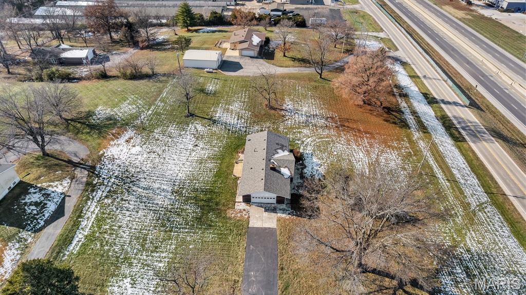 Property zoning has already been changed to C2 General Commercial District and is ready for the new owner to bring plans to the County! Existing structure has great bones and could be renovated to fit a wide range business needs (vet office, doctor office, professional services, day care and so much more). Property is just over an acre and has endless possibilities! Very conveniently located on Veterans Memorial Parkway with highway frontage and easy access to highway 70.