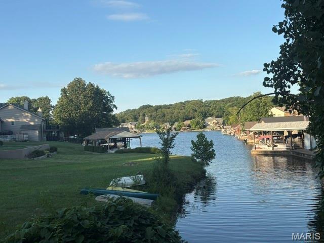 This is it! An incredible opportunity to own a waterfront lot on Lake Autumn, the largest lake in Raintree Plantation, for under $100,000. Enjoy beautiful water views and the perfect setting to build your lake lifestyle.

Whether you're looking to build your dream home or simply enjoy the perks of ownership, this lot offers exceptional value and access to everything Raintree Plantation has to offer. Live like you're on vacation every day with resort-style amenities, including: 4 private community lakes for fishing, boating, kayaking Beaches, swimming, and scenic lake views Golf course, country club, and on-site restaurant Hiking, biking trails, campgrounds, and sand volleyball A golf cart-friendly community for relaxed neighborhood living Ownership includes access to the Country Club for just $271/year, and full community amenities for only $250/year. All of this just 35 minutes from South County (63128)! See all photos for a glimpse into the incredible Raintree lifestyle. As a resident myself, I can confidently say: it’s an amazing place to live, play, and relax. Come join us!